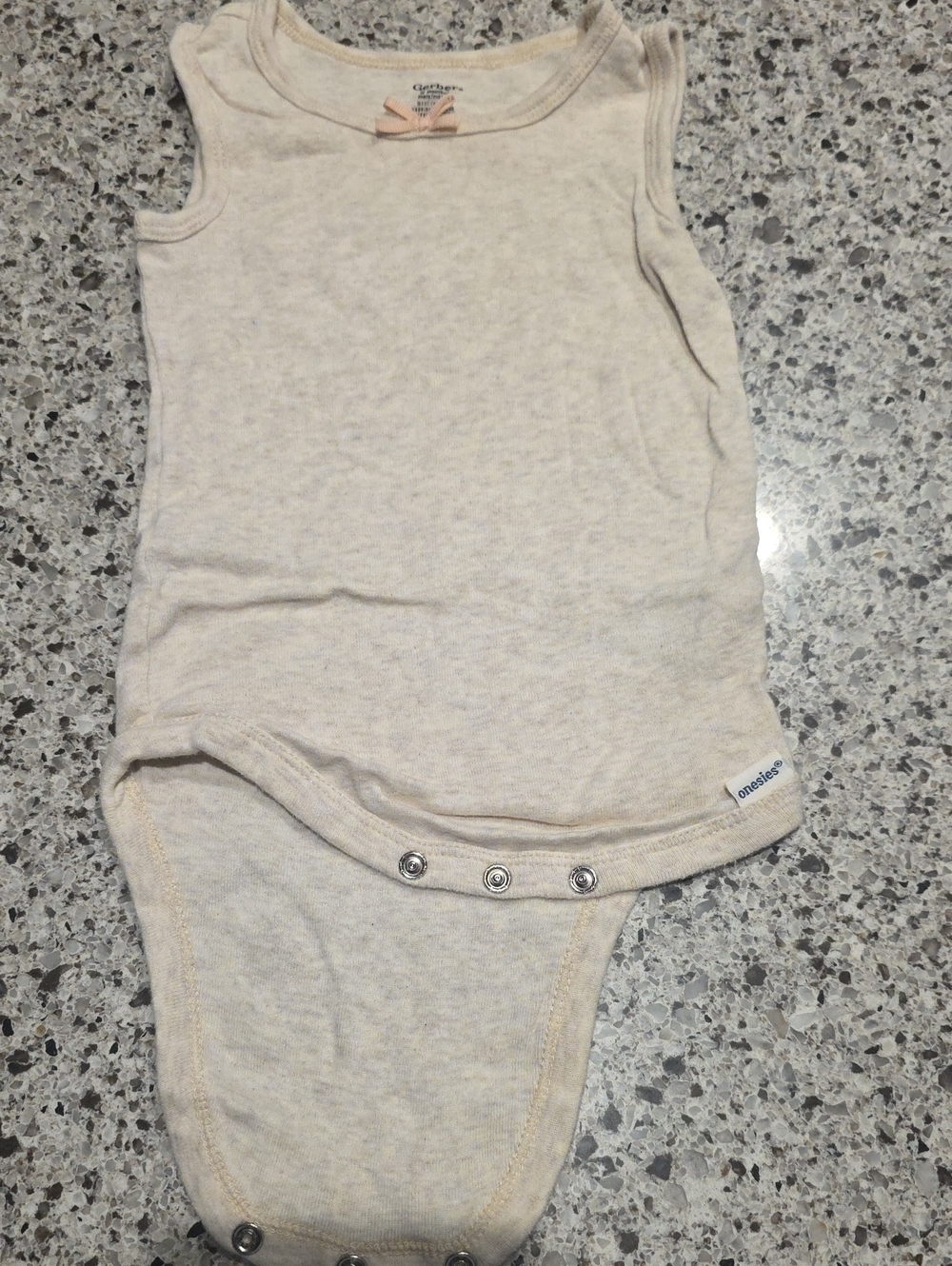 Gerber Cream Sleeveless Baby Onesie with Snap Bottom